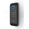 Angled view of black Philips smart rim lock touchscreen keypad with illuminated numbers on a white wall