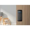 Philips smart rim lock installed on a wooden door in a modern living room interior